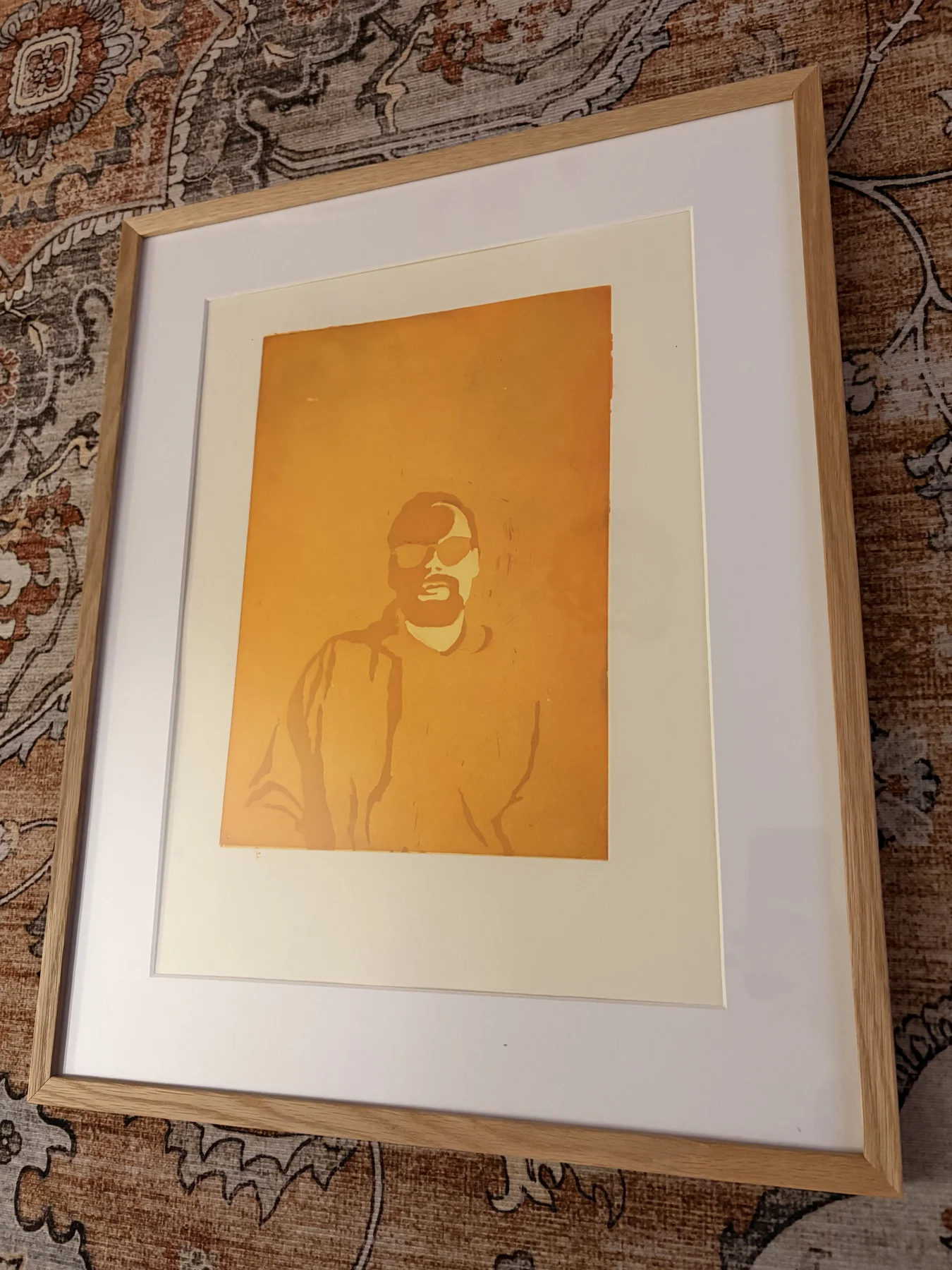 Aurinkolasimies - kehystettynä